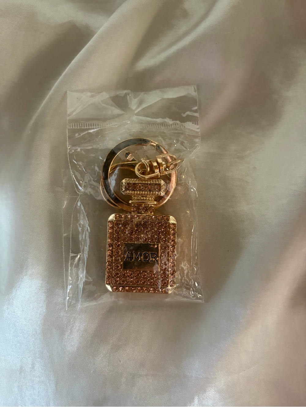 Pink perfume bottle keychain/bag charm